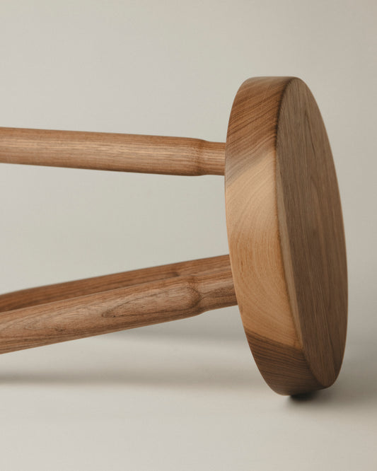 Detail of the seat in walnut tall stool. Made by Yubero Torno.